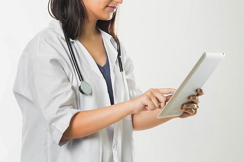 Doctor holding a tablet
