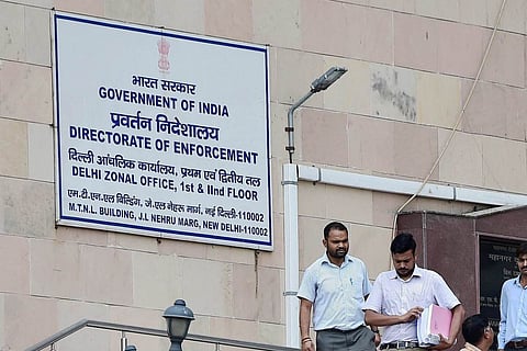 Officials at the Directorate of Enforcement office in New Delhi