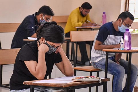 Students writing exam amid pandemic