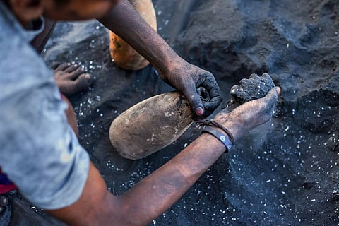 A worker handling firecracker chemicals