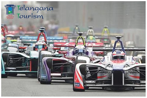 Formula E race cars on the track
