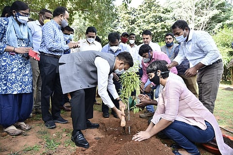 BBMP Chief Commissioner Gaurav Gupta planting a tree
