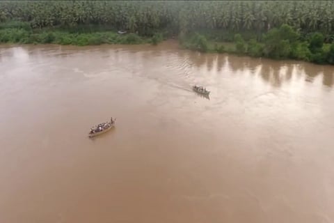 People travelling in boats in East Godavari