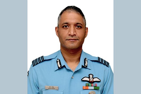 Group Captain Varun Singh in his IAF uniform looking into the camera