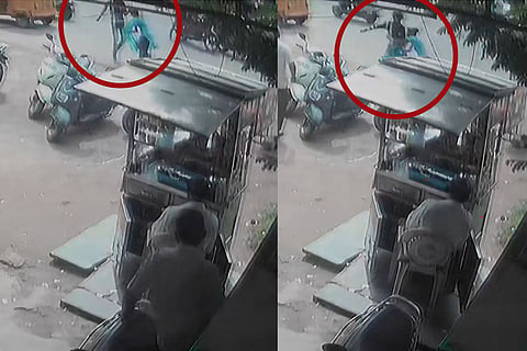 The woman being stabbed by the assailant