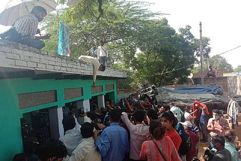 Reporters at house of Hathras rape victim's family's house