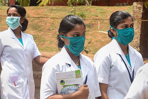 Medical professionals wearing masks cuz of COVID19