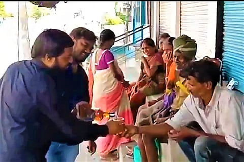 Man held after video of him distributing liquor in Hyderabad goes viral