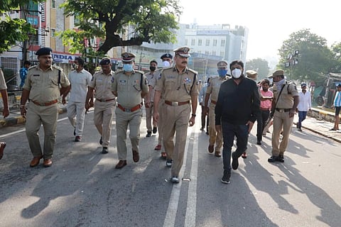 Hyderabad police commissioner Anjani Kumar walking with his colleagues during an inspection to examine the impact of waterlogging