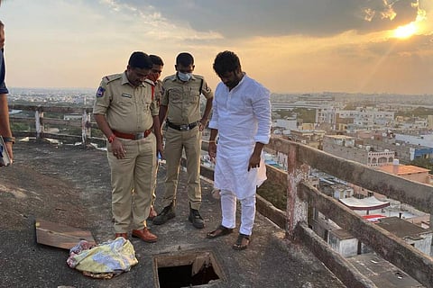 Hyderabad police officials inspecting public water tank