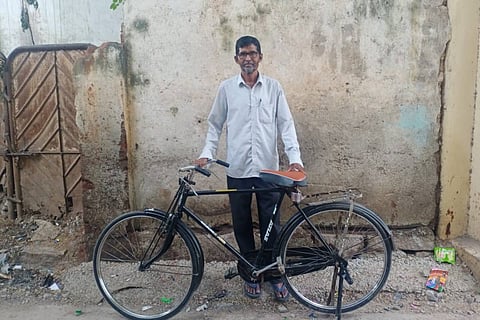 Shaik Amer with his bicycle