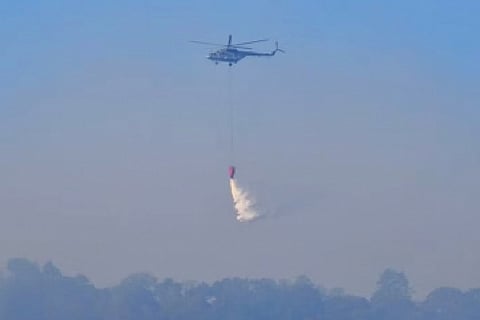 IAF chopper dousing fire