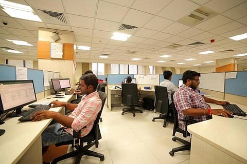 Representative image of employees working