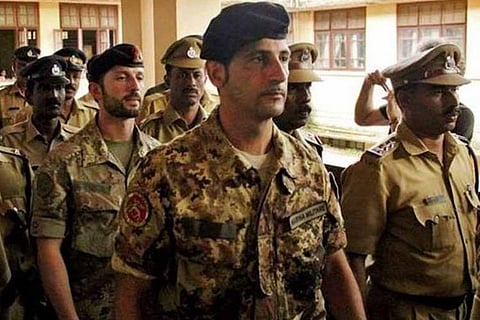 Two Italian marines who shot dead two Indian fishermen off Kerala coast arriving at a court accompanied by police at a court
