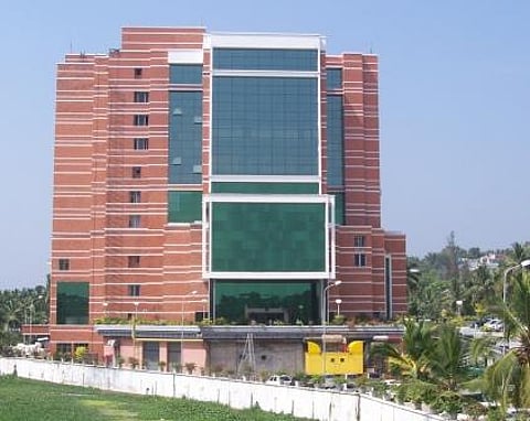 Doctors remove half a kg of concrete from Kerala temple tragedy survivor's body