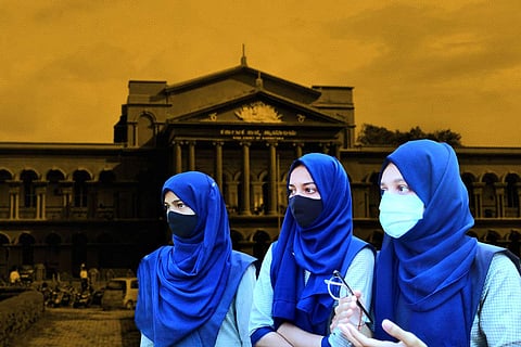 Muslim students wearing hijab with the Karnataka High Court in the background