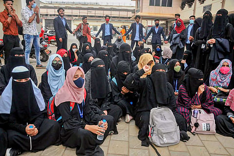 protest by students wearing hijab after being denied entry to their education institutions