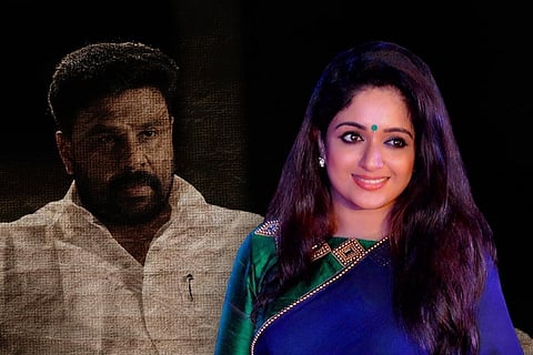 Actor Kavya Madhavan against the backdrop of actor Dileep