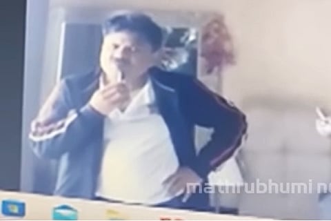 A man seen brushing his teeth or shaving during a virtual Kerala High Court hearing