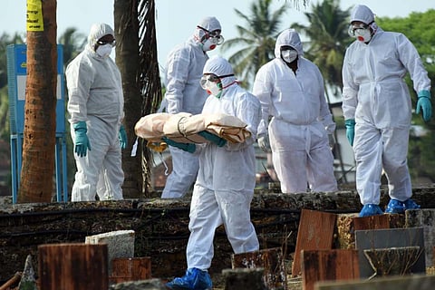 'We were numb': Kerala health workers describe burying baby who died of COVID-19