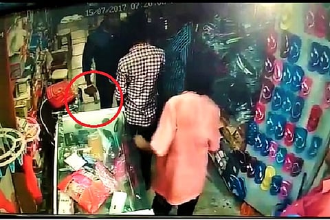 Watch: Two Telangana cops assault shopkeeper in Khammam, threaten him with gun