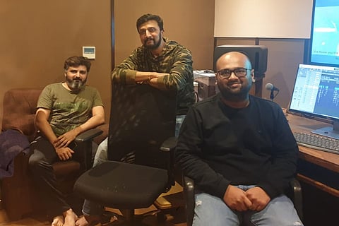 actor Kichcha Sudeep, director Anup Bhandari and sound engineer Bakkesh working together for voiceover work of Vikrant Rona