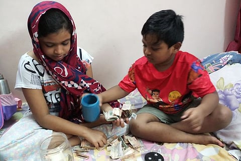 Small hands, big hearts: Kerala siblings break piggybank for flood relief
