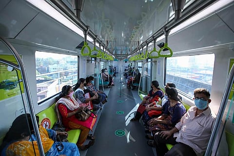 Passengers travelling in a Kochi Metro Train