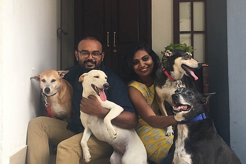 Pratheek and Tina with their four dogs at Studio Kokaachi