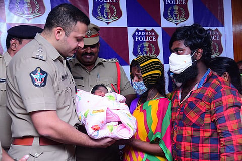 Krishna district SP along with parents of the baby, who went missing