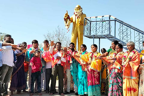Residents of Telangana’s Marepalli village take a pledge against illegal liquor shops