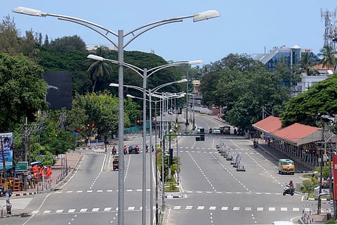 A deserted road in Kerala's Thiruvananthapuram during COVID-19 induced triple lockdown