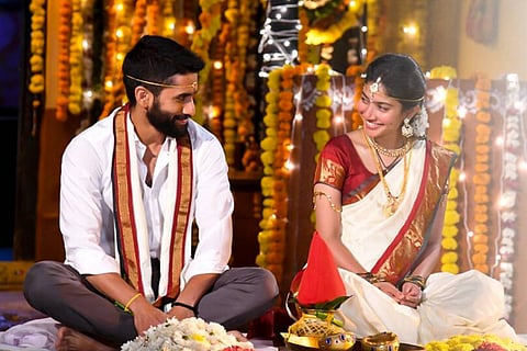 Naga Chaitanya and Sai Pallavi on a poster for Love Story