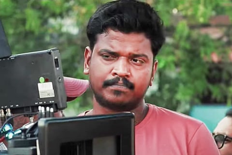 Lukman Lukku looking into camera in a screengrab