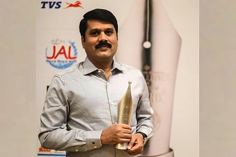 M Gunasekaran with Ramnath Goenka Awards for his coverage on Cyclone Ockhi