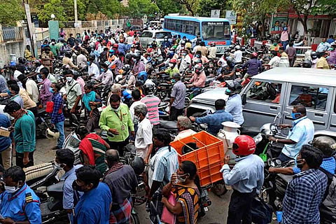 Scores gather outside Madurai Collectorate after officials issue new vehicle pass rules