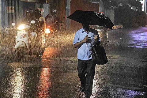 Person walking in the rain