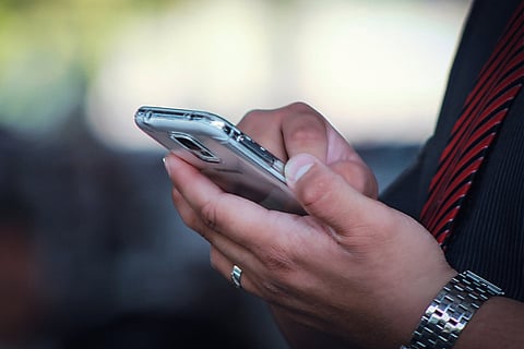 Man using mobile phone