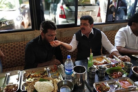 Won over by Mangalurean seafood, Karnataka minister gifts chef Rs 25k, trip to Mecca