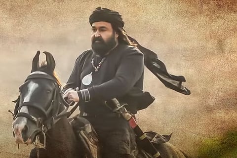Mohanlal is seen riding a horse and is sporting a mystic look in a long beard as Kunjali Marakkar IV.