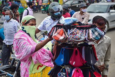 Use of masks declining in India, govt warns amid Omicron concerns