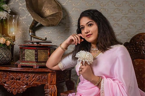 Actor Meghana Raj in a pink saree