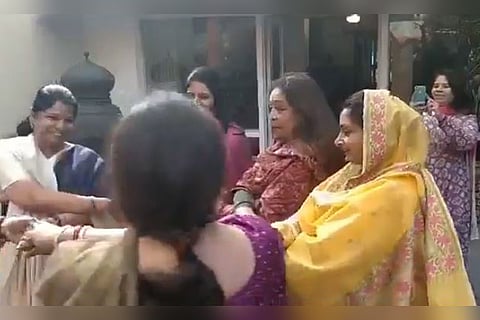 Friends across party lines: Watch women MPs whirl together at lunch party