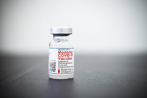 A bottle with a Moderna COVID19 vaccine label