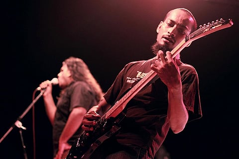 A representative picture of musicians playing in a show