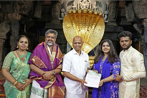 The muslim couple handing over the donation to TTD's EO