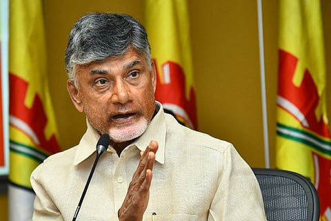 TDP chief Chandrababu Naidu speaking into a mic