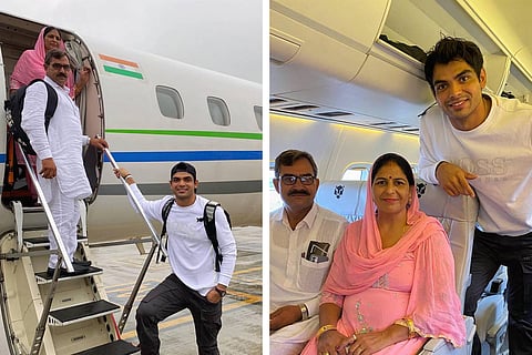 Neeraj Chopra posing with his parents on their first flight