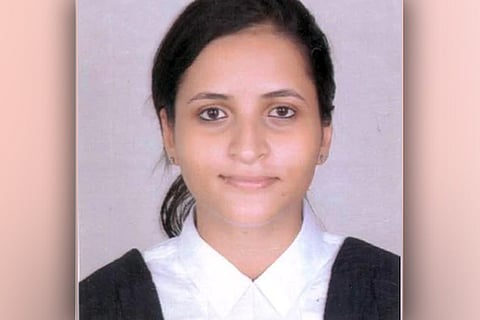 A photo of lawyer and activist Nikita Jacob, named in the Greta Thunberg toolkit case, looking into the camera