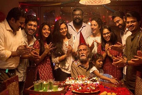 A poster from Njandukalude Nattil Oridavela featuring the star cast